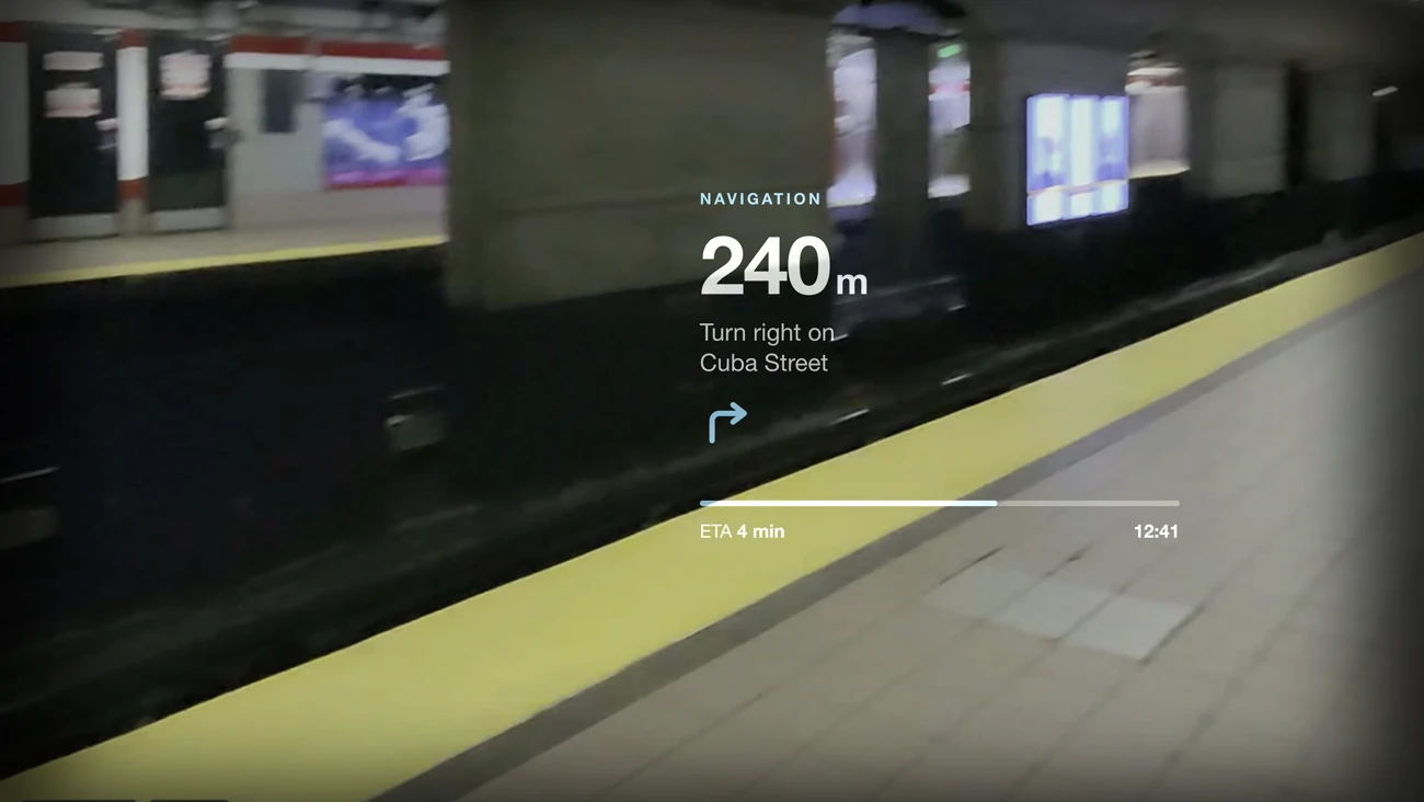 The same frame composited additively over a train platform
